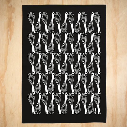 White Whisks on Black Tea Towel